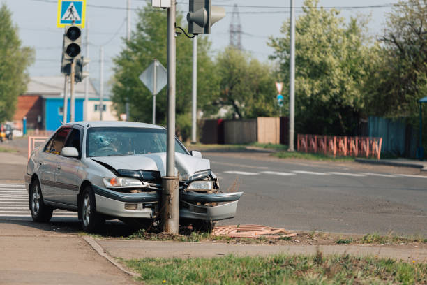 Single vehicle accident damage from pole impact